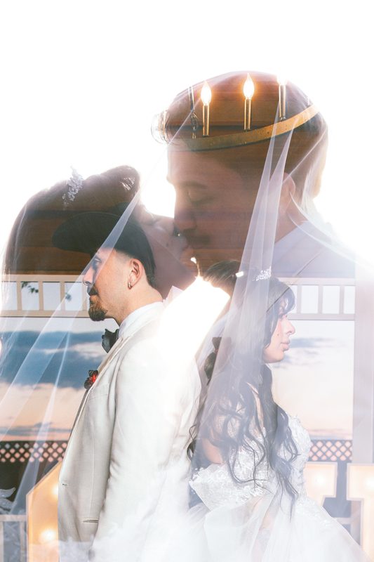 Double exposure of a couple with a church ceiling